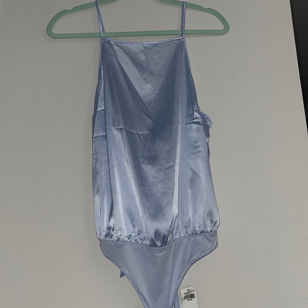 Silky light blue open back with bow bodysuit